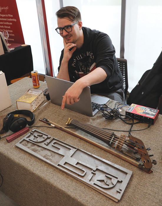 George Neufeld with his 7-string violin prototype.